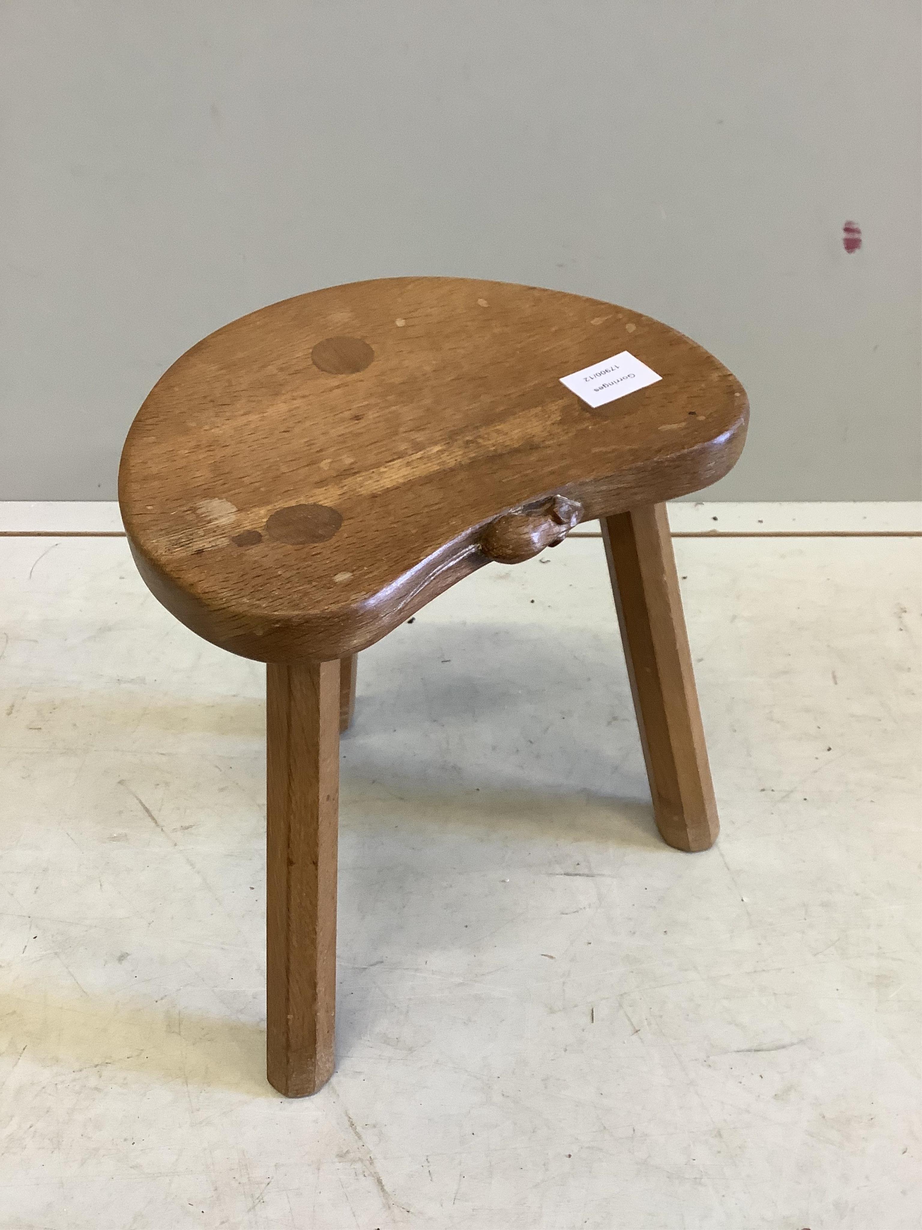 Robert Thompson (the Mouseman) an oak stool, width 30cm, depth 24cm, height 35cm